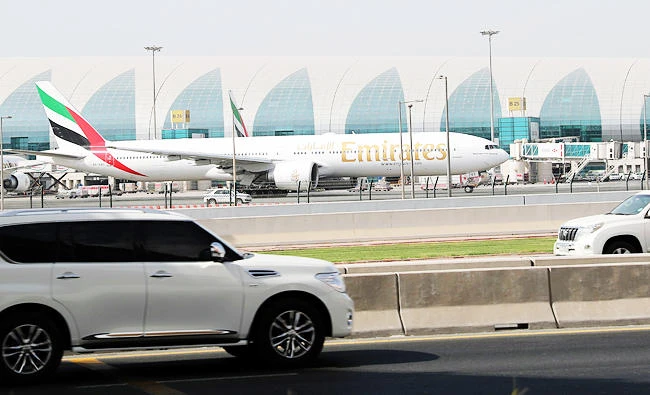 A photo taken on August 10, 2017, shows an Emirates airline Boeing 777 parked on the tarmac at Dubai airport. (AFP)