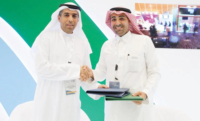 Nawaf
Al-Sahhaf, CEO of Badir, and Dawood Al-Shezawi, chief executive officer of AIM Startup Forum, at the signing ceremony held recently in Riyadh.