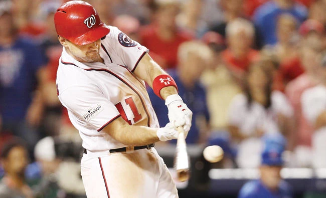 Ryan Zimmerman of the Washington Nationals hits a three run home run against the Chicago Cubs in the eighth inning during Game 2 of the National League Division Series at Nationals Park on Saturday in Washington, DC. (AFP)