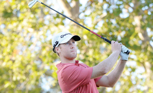 Tyler Duncan plays his shot from the 17th tee during the third round of the Safeway Open at the North Course of the Silverado Resort and Spa on Saturday in Napa, California. (AFP)