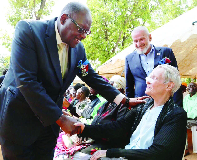 Zimbabwean Health Minister Dr. David Parirenyatwa visits patients in the medical camp.