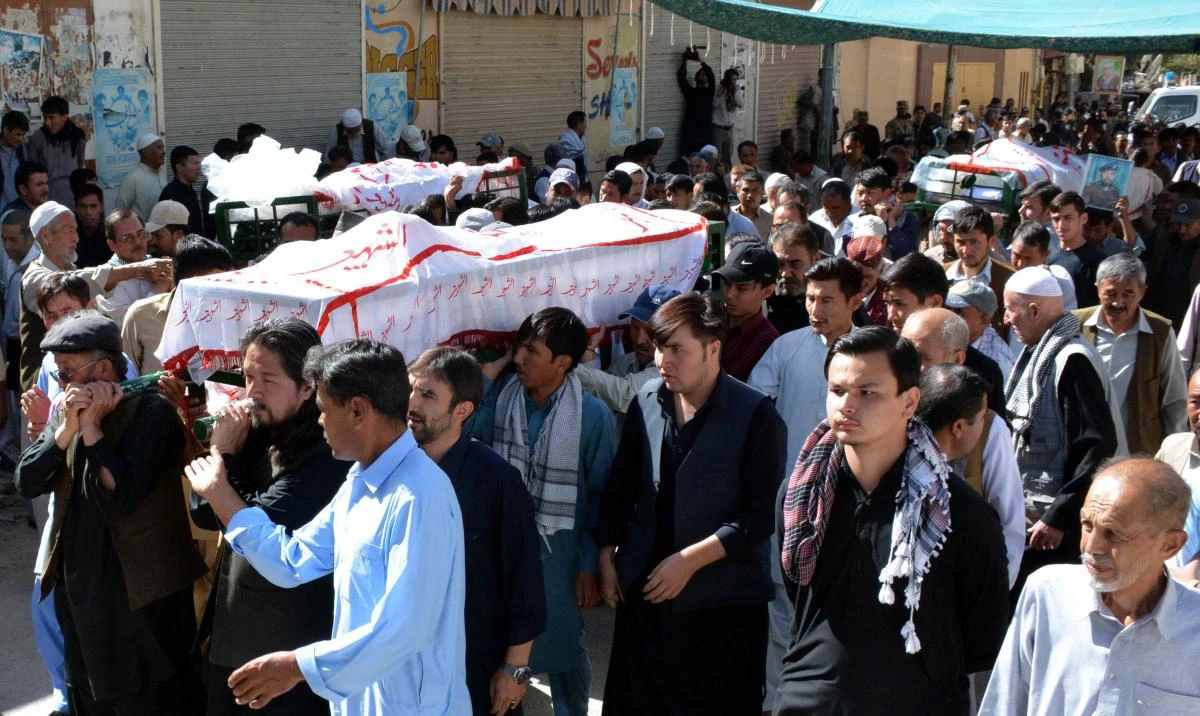 Pakistani Shiite Muslims carry the coffins of victims of an attack on a vehicle by gunmen during their funeral in Quetta on October 9, 2017. (AFP)
