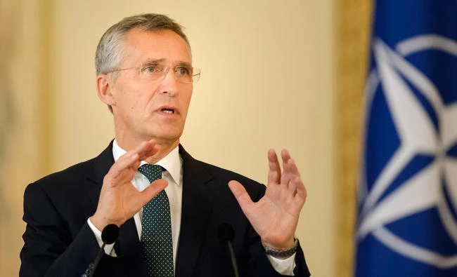 NATO Secretary General Jens Stoltenberg gestures during a joint press conference in Romania, on Monday. (AP)