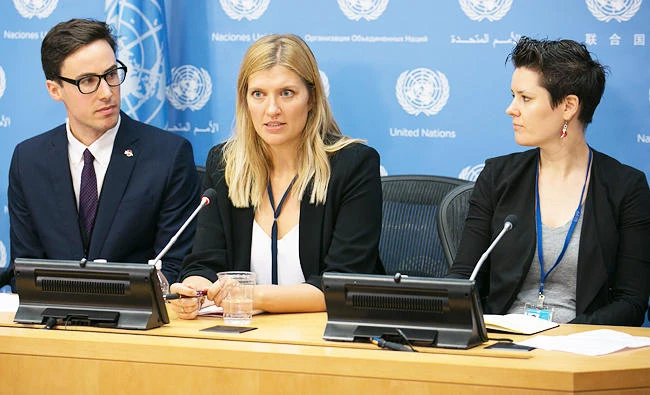 ICAN Asia-Pacific Director Tim Wright, left, and ICAN Steering Group member Ray Acheson, right, look on as ICAN Executive Director Beatrice Fihn speaks during the press conference by the International Campaign to Abolish Nuclear Weapons (ICAN) at the United Nations on Monday in New York City. (AFP)