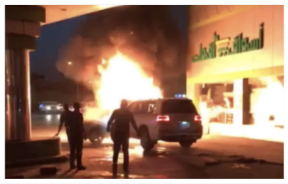 Saudi man pushes burning car away from gas station