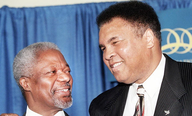 In this Oct. 23, 2000, file photo, U.N. Secretary-General Kofi Annan, left, jokes with boxing great Muhammad Ali during a photo session with U.N. Messengers of Peace at the United Nations. (AP)