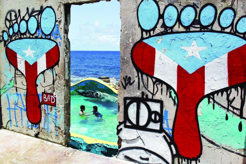 A concrete wall blanketed with graffiti, in the seaside slum La Perla,
in San Juan, Puerto Rico. (AP)