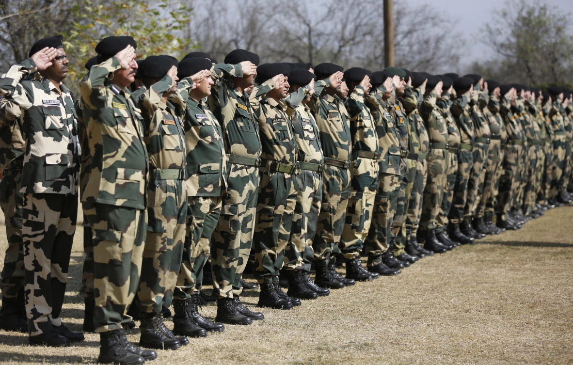 Indian Border Security Force (BSF) soldiers salute during a wreath-laying ceremony of their slain colleague on the outskirts of Srinagar, Indian-controlled Kashmir, Wednesday, Oct. 4, 2017. (AP)
