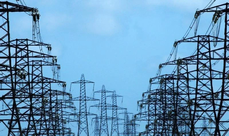 Above, power lines and pylons stretch out from Dungeness nuclear power station in south east England. (Reuters)