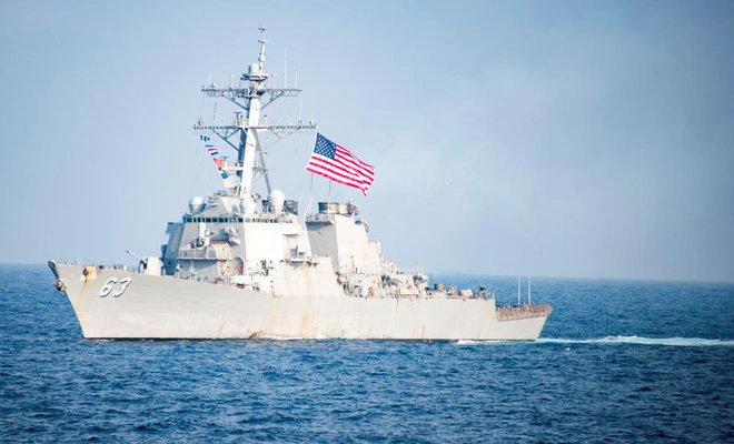 China protests to US over sail-by in disputed waters