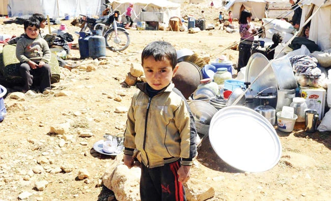 A young Syrian refugee in Lebanon. (Reuters)