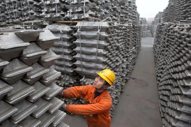 The US Commerce Department in August imposed preliminary countervailing duties of about 17 percent to 81 percent on imports of Chinese aluminum foil. Above, a Chinese worker checks aluminum ingots for exports. (Reuters)
