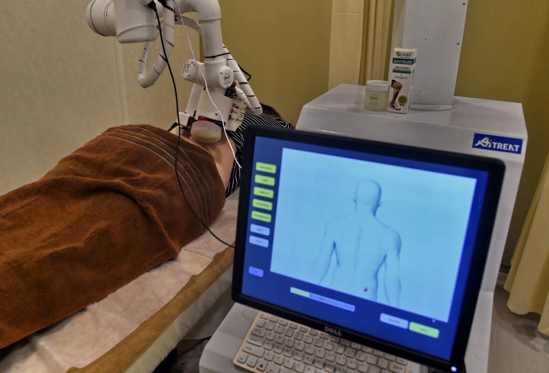 Emma the robot masseuse gets to work in Singapore