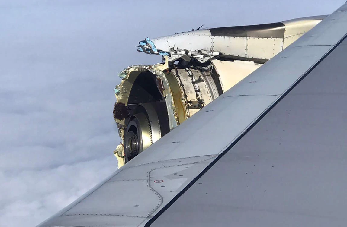 Above, a photo from the Twitter account of @Bdaddy1391 shows the damaged engine of an Air France A380 aircraft. The Air France A380 superjumbo carrying more than 500 people made an emergency landing in Canada after suffering “serious damage” to one of its four engines. (Twitter via AFP)