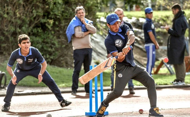 In this photograph, Afghan and Pakistani migrants take part in a cricket training session in Saint-Omer, northern France on September 30, 2017. (File photo by AFP)
