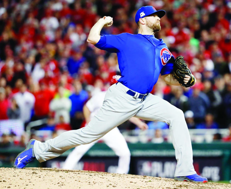 Chicago Cubs relief pitcher Wade Davis throws during the eighth inning in Game 5 of baseball’s National League Division Series against the Washington Nationals, at Nationals Park, Washington. (AP)
