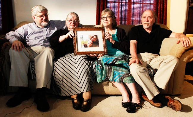 In this June 4, 2014, file photo, from left, Patrick Boyle, Linda Boyle, Lyn Coleman and Jim Coleman hold photo of their kidnapped children, Joshua Boyle and Caitlan Coleman, who were kidnapped by the Taliban in late 2012, Wednesday, June 4, 2014, in Stewartstown, Pa. (AP)