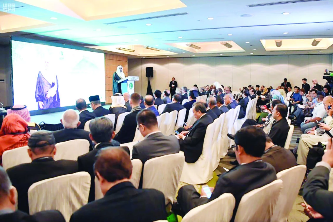 MWL Secretary-General Mohammed Al-Issa speaks at the second Forum of the Heads of Islamic Cultural Centers and Associations outside the Islamic world in Singapore on Saturday. (SPA)