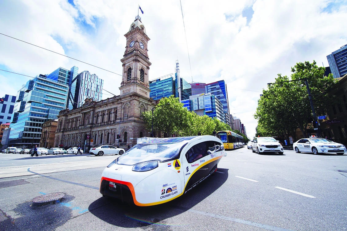 Solar Team Eindhoven vehicle ‘Stella Vie’ from the Netherlands pictured in front of the Adelaide Town Hall near the finish line of an epic 3,000-kilometer solar car race across Australia’s outback. (AFP)