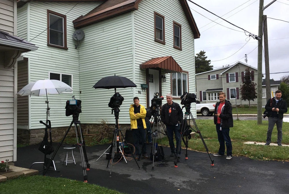 Journalists wait outside Canadian hostage Joshua Boyle’s family home in Smiths Falls, Ontario, Canada, on October 14, 2017. Freed Canadian hostage Joshua Boyle accused his kidnappers of murdering his baby daughter and raping his wife during his family’s years-long captivity by the Haqqani network, a Taliban-affiliated group operating in Afghanistan and Pakistan. (AFP/Mike Carroceto)