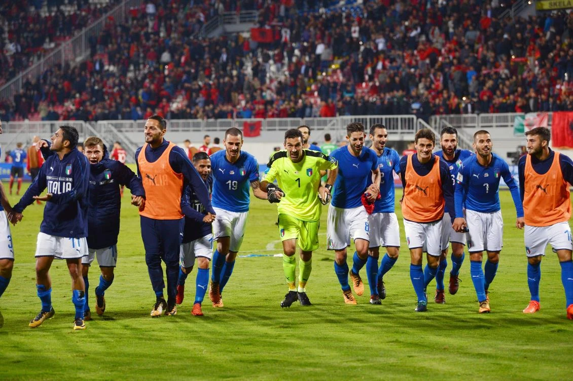 Italy’s players celebrate after winning the FIFA World Cup 2018 qualification football match between Albania and Italy at Loro Borici Stadium in Shkoder on October 9, 2017. (File photo by AFP)