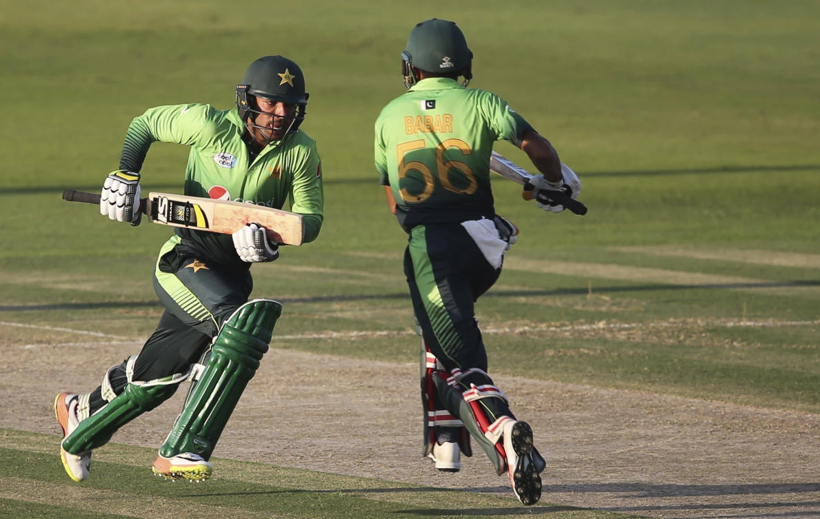 Pakistan's Shadab Khan and Jaber Azam run between wickets during their second ODI cricket match against Sri Lanka in Abu Dhabi, United Arab Emirates. (AP)