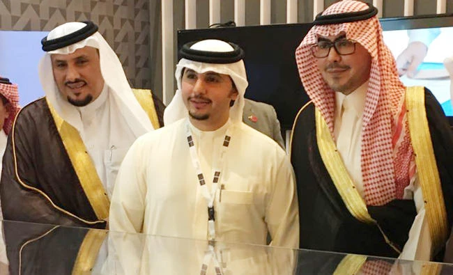 Sultan Batterjee, president and founder of Lifestyle Developers, center, at the American Express World Luxury Expo in Jeddah.