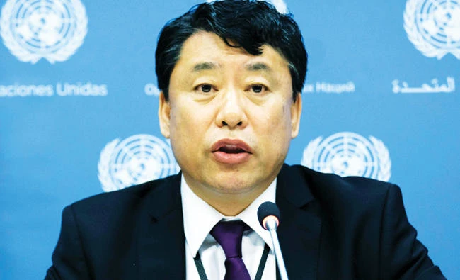North Korea's deputy ambassador to the United Nations Kim In Ryong answers a question wearing a pin with images of North Korean leader Kim Jong-Un and his late father Kim Kim Jong-il, during a press conference at the UN headquarters in New York, in this May 19, 2017 photo. (AFP)
