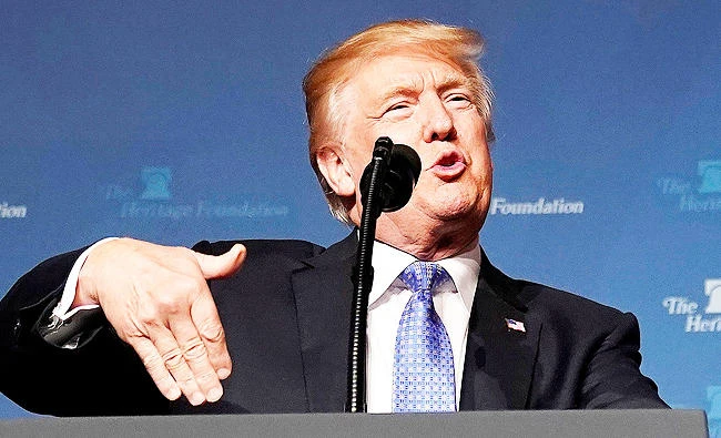 Trump’s fortune slides by $600 million on Forbes wealth list