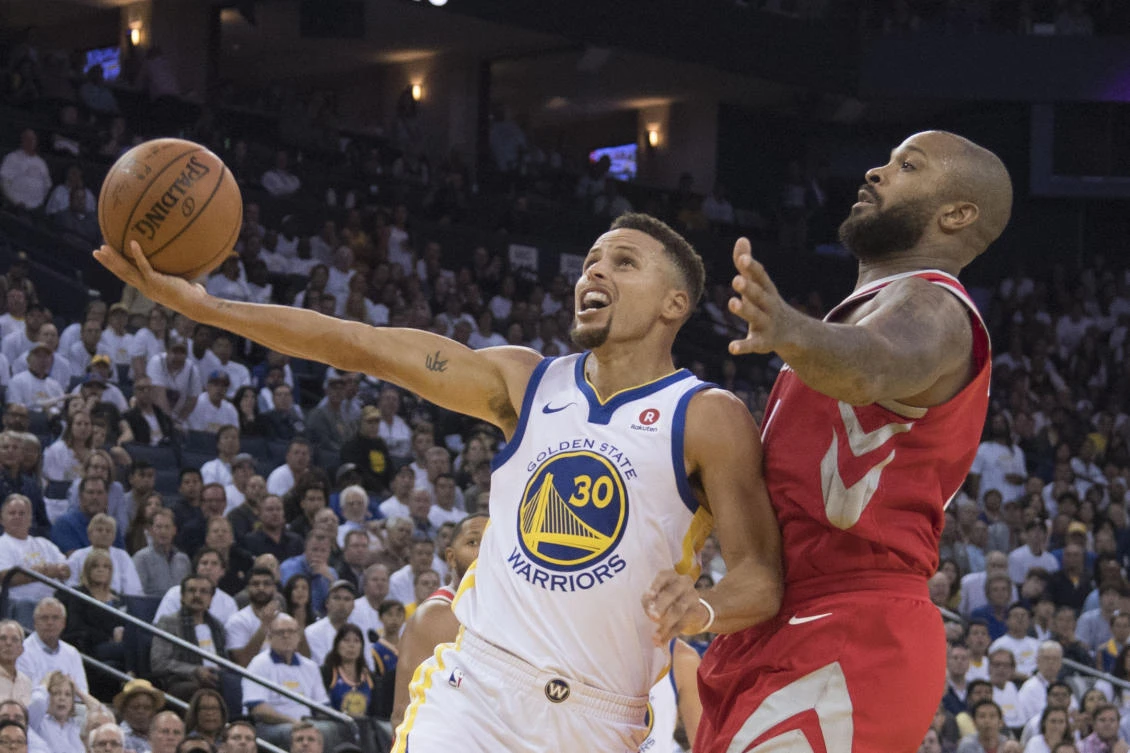 Golden State Warriors guard Stephen Curry (30) drives for a shot against Houston Rockets forward PJ Tucker (4) during the fourth quarter at Oracle Arena. The Rockets defeated the Warriors 122-121. (USA TODAY Sports)