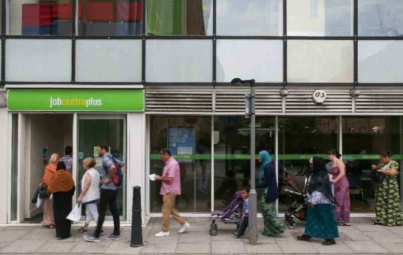 A total of 1.4 million British people were recorded unemployed at the end of August, down 215,000 on a year earlier. (AFP)