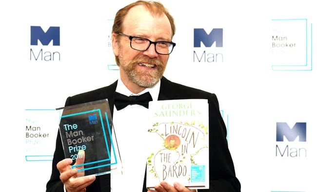 George Saunders poses after winning the Man Booker Prize for Fiction 2017 in London. (Reuters)