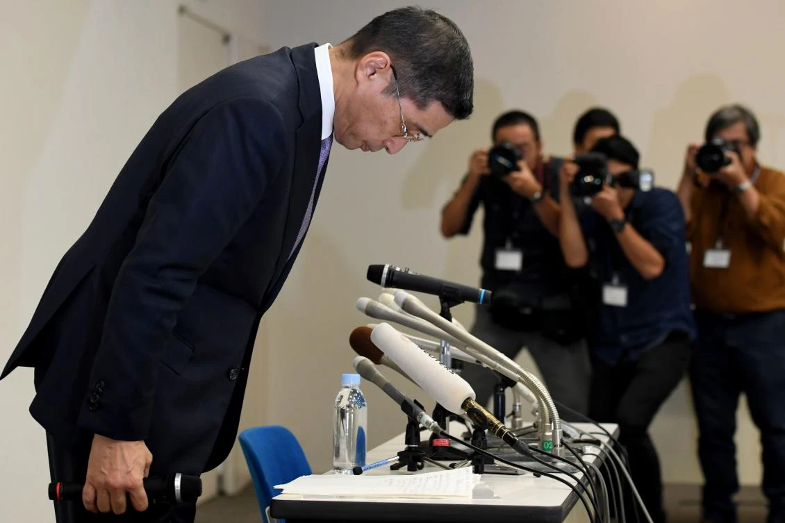 Nissan Motors CEO Hiroto Saikawa bows during a press conference in Yokohama. Saikawa said that “those customers who trusted the measures that we took and purchased our vehicles, we violated their trust.” (AFP)