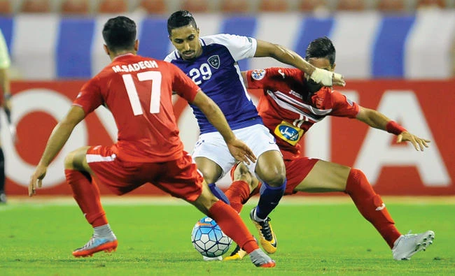 Al Hilal’s Salem Al-Dawsari has been one of the driving forces behind both his club and country’s recent success. (AFP)