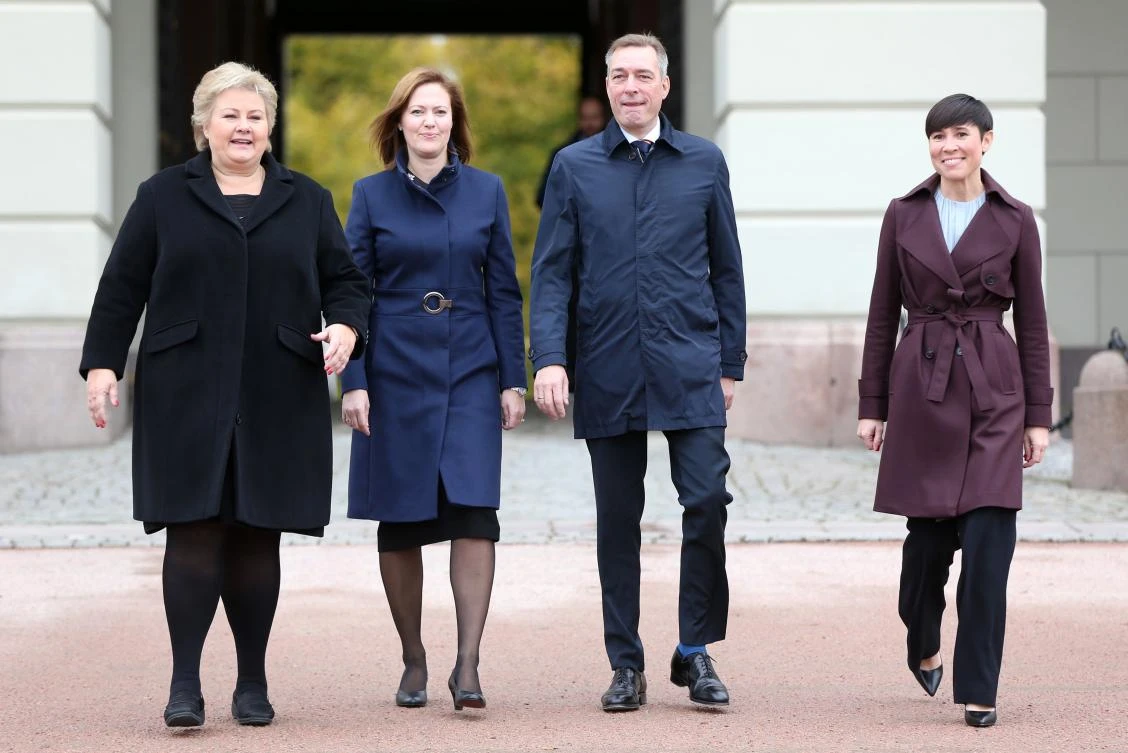 Norwegian Prime Minister Erna Solberg, left, walks with newly-appointed Minister for EEA and EU Affairs, Marit Berger Rosland, second left, Minister of Defense, Frank Bakke-Jensen, second right, and Foreign Affairs Minister Ine Eriksen Soreide outside the Norwegian Castle on October 20, 2017. (AFP)