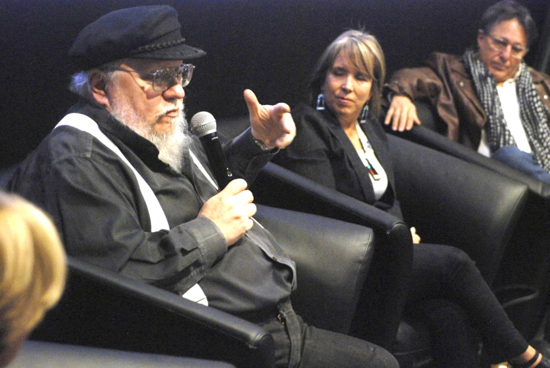Author and film producer George R. R. Martin, left,
speaks in Santa Fe, NM.