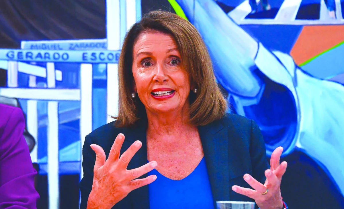 House Democratic Leader Nancy Pelosi speaks with young immigrants and community leaders during a meeting in Los Angeles this week. (AFP)