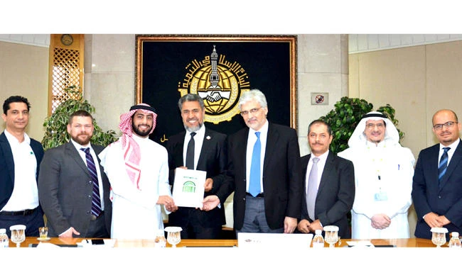 From left, Kashif Younus, technical sales manager at Ateon; Matthew Van Niekerk, founder andCEO of SettleMint; Abdulaziz Alhamrani, CEO of Alhamrani Group Holding; Syed Aqa, actingpresident and IDB vice president; Mohamed Jouini, IDB vice president; Husam Yaghi, presidentof Ateon; Sami Al-Suwailem, head of Financial Product Development Center, IDB and IRTI; andHilal Houssain, senior financial product development specialist — fintech, IRTI and IDB.