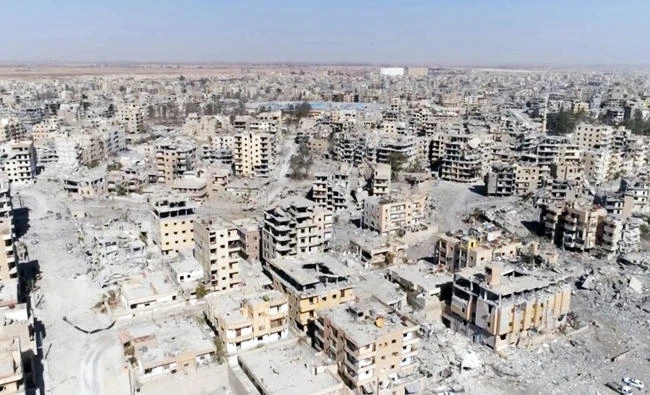 This Oct. 19, 2017 frame grab made from drone video shows damaged buildings in Raqqa, Syria two days after Syrian Democratic Forces said that military operations to oust the Daesh group have ended and that their fighters have taken full control of the city. (AP)