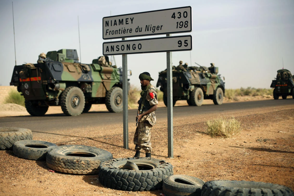 This 2013 photo shows French armored vehicles heading toward the Niger border before making a left turn north in Gao, northern Mali. American and French forces have spent years providing training and support to the militaries of Mali, Niger and other vulnerable countries in Africa where Islamic extremism has become entrenched over the past decade.(AP)