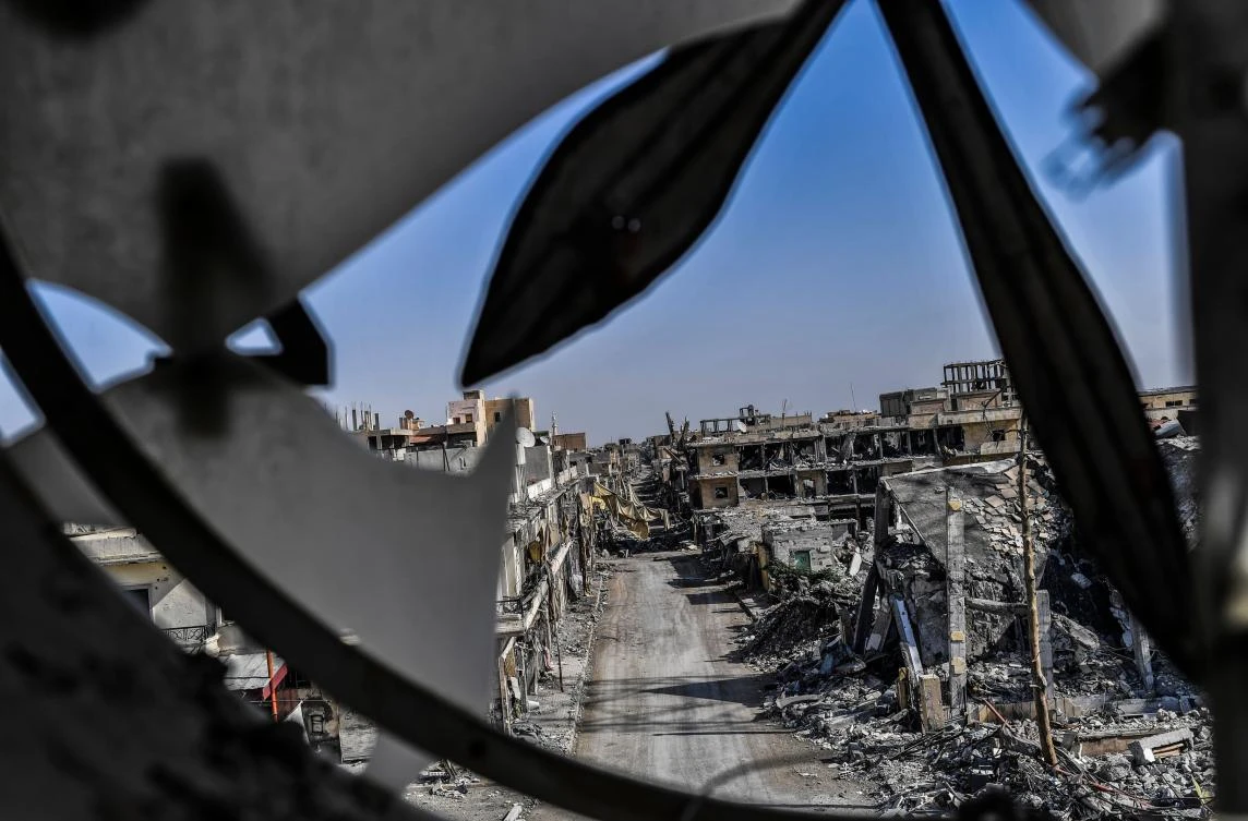 Above, heavily damaged buildings in Raqqa after a Kurdish-led force expelled Daesh fighters from the northern Syrian city. (AFP)