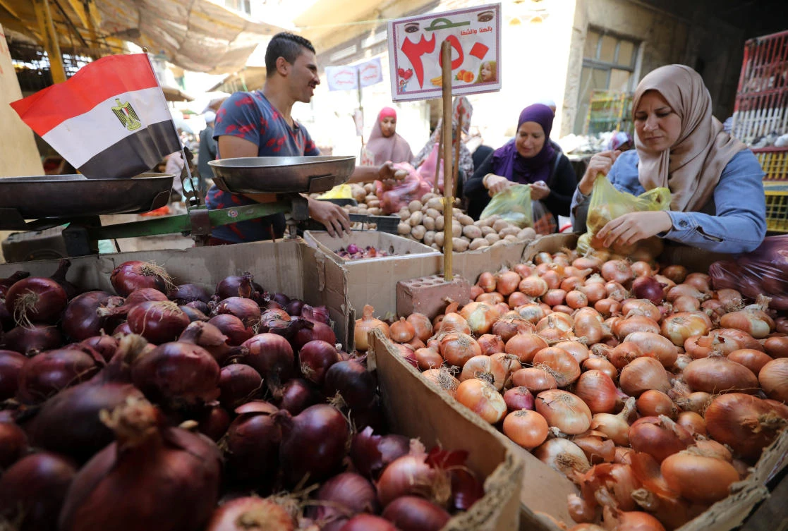 Above, Egyptians shop at a vegetable market in Cairo. Egypt’s agricultural export season runs from September through August. (Reuters)