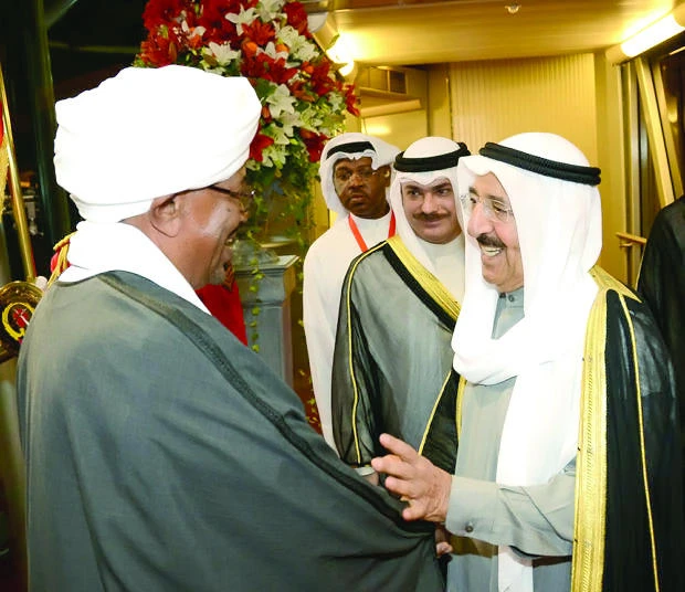 Kuwait’s Emir Sheikh Sabah Al-Ahmad Al- Sabah with Sudanese President Omar Al-Bashir in Kuwait. (File photo courtesy of Kuwait’s Emiri Diwan)