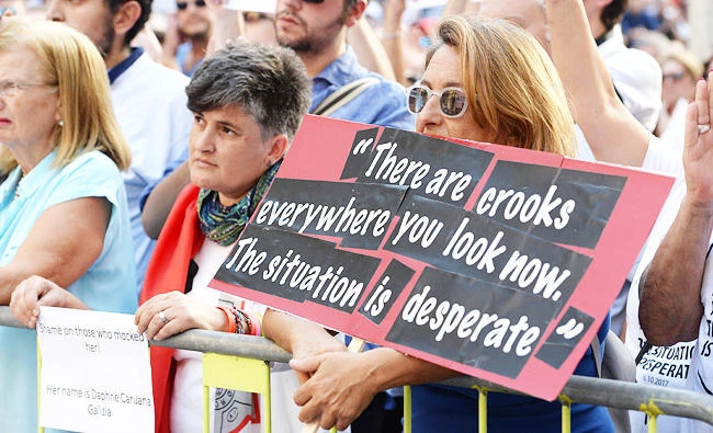 Protesters call for justice after Maltese journalist’s killing
