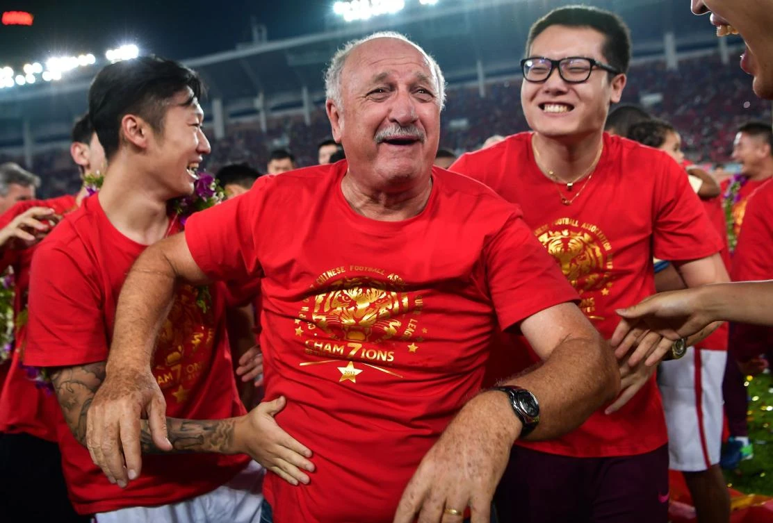 Head coach of China’s Guangzhou Evergrande Luiz Felipe Scolari celebrates after winning the Chinese Super League (CSL) football tournament in Guangzhou, in China’s southern Guangdong province on Oct. 22, 2017. (AFP)