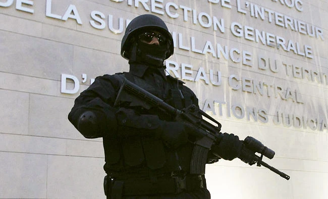 A Moroccan policeman stands guard at the Central Bureau of Judicial Investigation office in Sale, in this March 23, 2015 file photo. (Reuters)