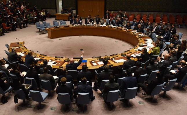 The UN Security Council votes to extend investigations into who is responsible for chemical weapons attacks in Syria at the United Nations on Tuesday. (AFP / TIMOTHY A. CLARY)