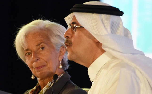 International Monetary Fund Managing Director Christine Lagarde looks at the CEO of Saudi Aramco, Amin Nasser, as he speaks during the Future Investment Initiative conference in Riyadh. (AFP)
