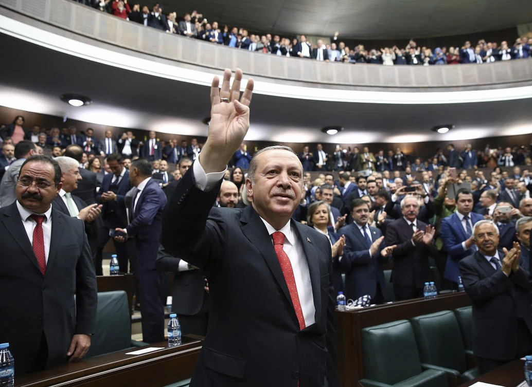 Turkey's President Recep Tayyip Erdogan gestures as he arrives to address the lawmakers of his ruling party in Ankara, Turkey. (Presidential Press Service, pool photo via AP)