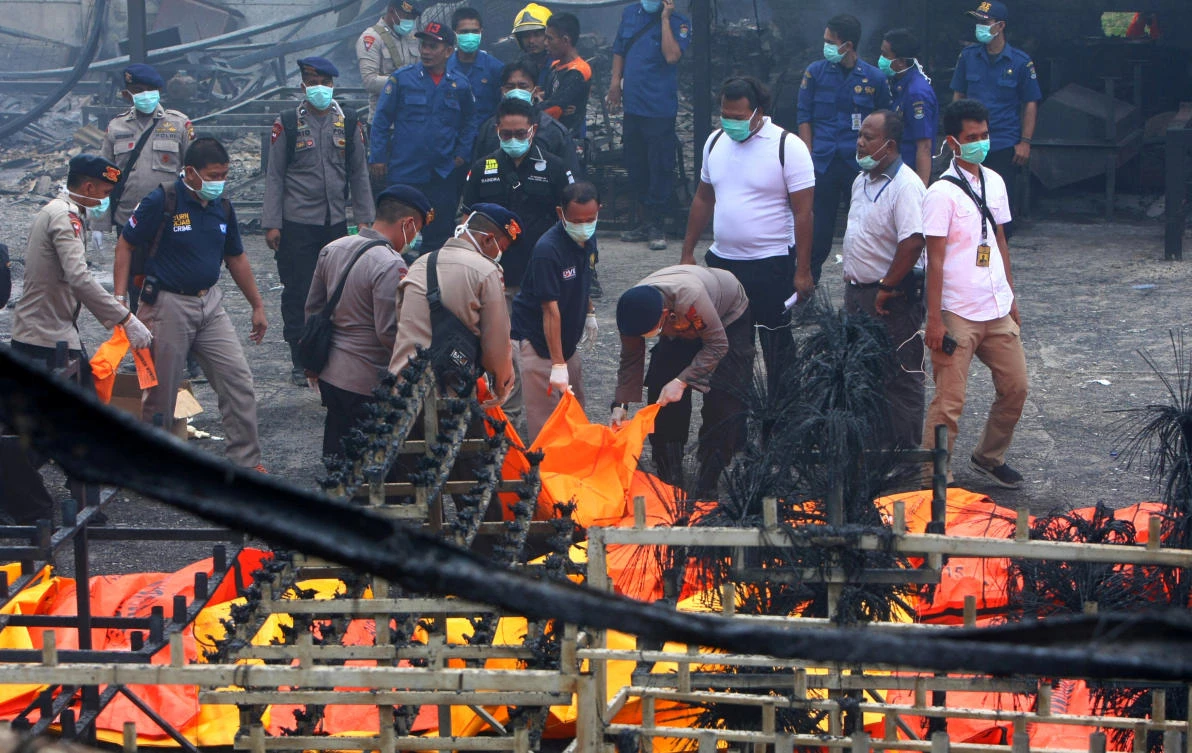 Indonesia police comb site of deadly fireworks factory explosions